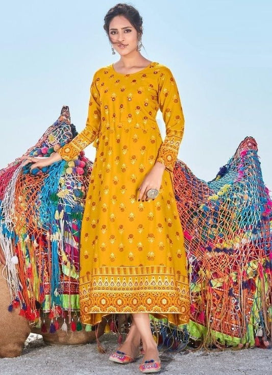 Women ethnic Yellow printed mirror work kurti