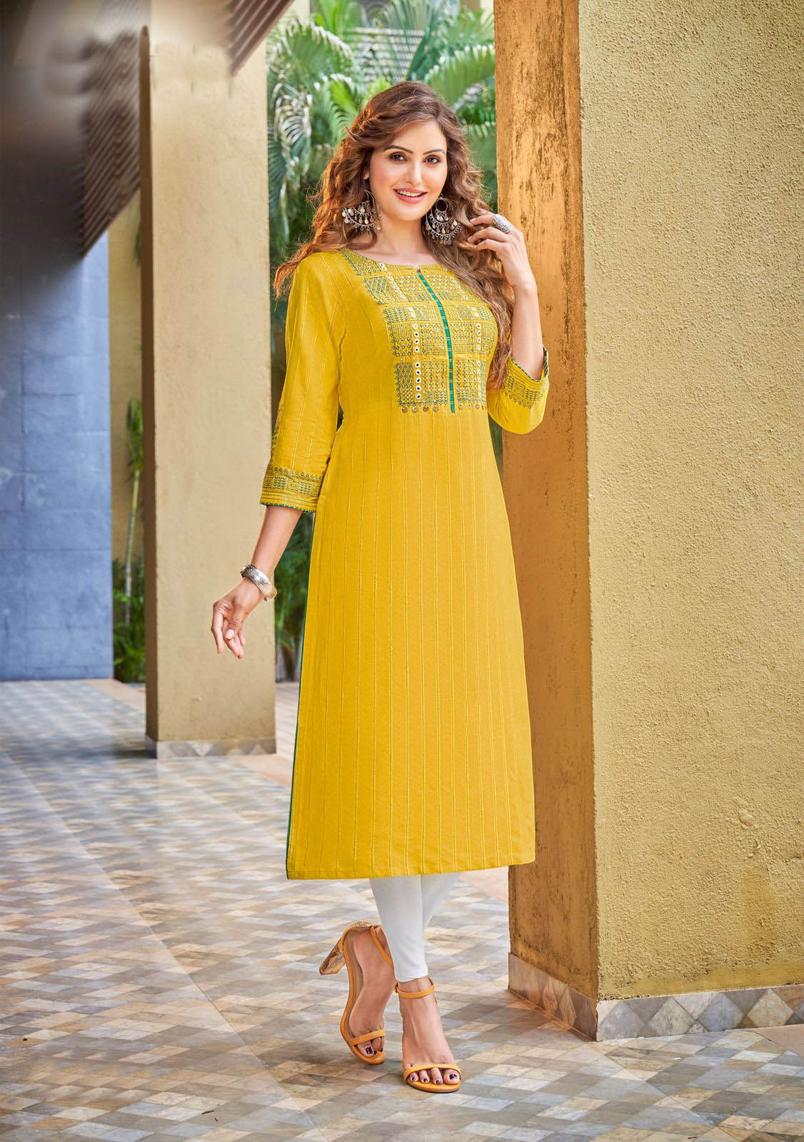 yellow embroidered hand work kurti